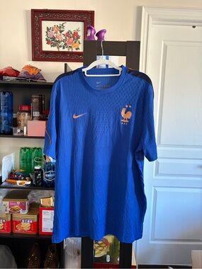 Nike Men’s Blue France Football Jersey with Orange Accents